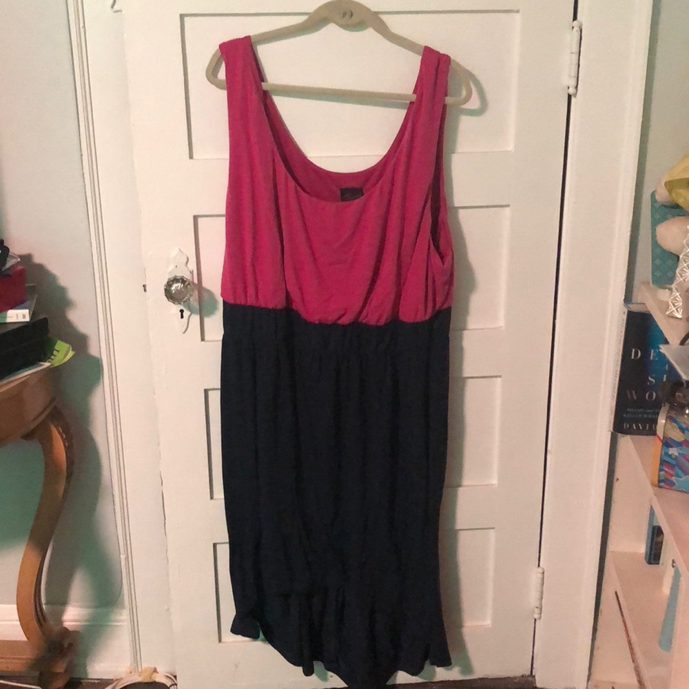 Pink sleeveless top and blue asymmetrical bottom dress.